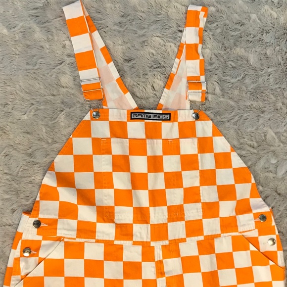 orange and white checkered overalls